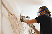 Man renovating walls