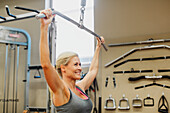 Woman exercising on gym