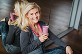 Portrait of woman with healthy smoothie