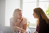 Two women working in office