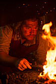 Blacksmith at forge