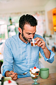 Man eating dessert