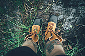 Man wearing hiking boots, low section