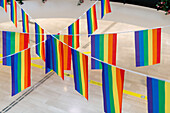 Rainbow flags hanging on rope