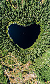 Aerial image of heart shaped lake