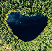 Aerial image of heart shaped lake