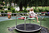 Girl on merry-go-round