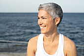 Portrait of mature woman at seaside