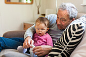 Baby girl with grandfather