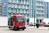 Red bus parked on street