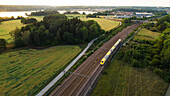 Train on tracks, aerial view
