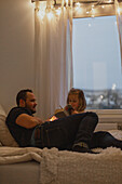 Father with daughter on bed