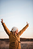 Woman doing peace sign