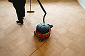 Vacuuming parquet floor