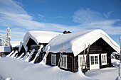 Holzhaus im Winter
