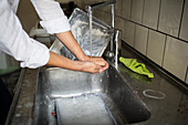 Woman washing hands