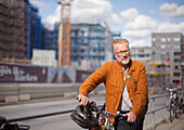 Mature man with bicycle