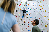 Boy on climbing wall