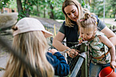 Teacher with children outside