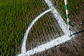 Corner white lines on soccer pitch