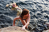 Girls swimming in sea