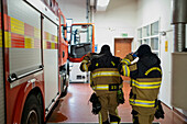 Firefighters in fire station