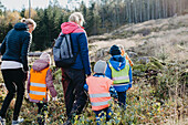 Playschool teachers walking with children