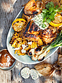 Grilled vegetables and chicken on plate