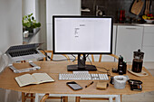 desktop screen on kitchen table