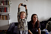 Boy celebrating after winning in video game