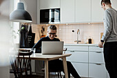 Couple in kitchen