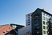 Apartment buildings under blue sky