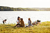 Women having picnic at lake