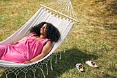 Woman relaxing on hammock