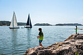 Boy fishing at lake