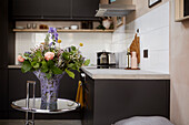 Bouquet of flowers in kitchen