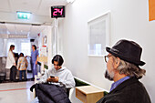 Patients waiting in outpatient clinic