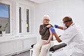 Senior woman getting vaccinated against Covid-19