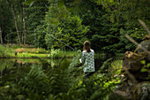 View of man fishing