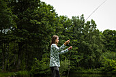 View of man fishing