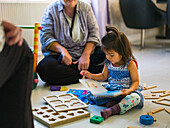 Girl playing on floor