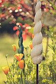 Close-up of spring flowers and garden decorations