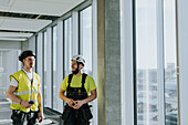 Men talking at construction site