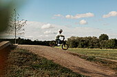 View of child cycling