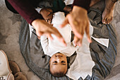 Parents with baby on floor