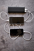 Cell phones connected to power bank