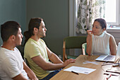 People in boardroom during business meeting