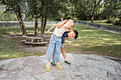 Portrait of child friends playing in park