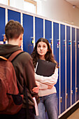 Teenagers talking at corridor