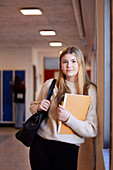 Teenage girl looking at camera